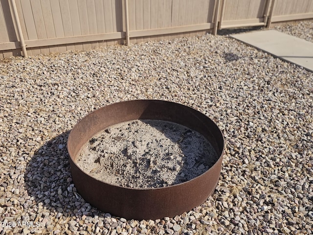 exterior details with a fire pit