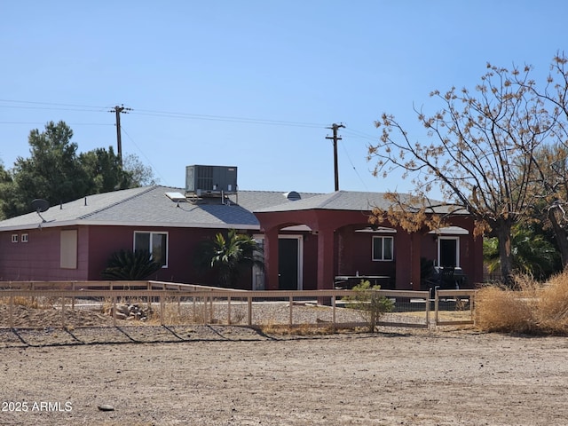 view of front facade with central air condition unit