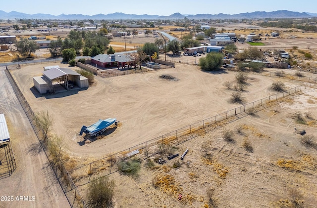 drone / aerial view featuring a rural view and a mountain view