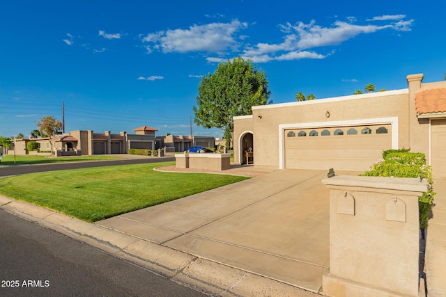 25225 S Glenburn Dr, Sun Lakes, AZ 85248 - pueblo-style house with a front lawn, stucco siding, an attached garage, and concrete driveway