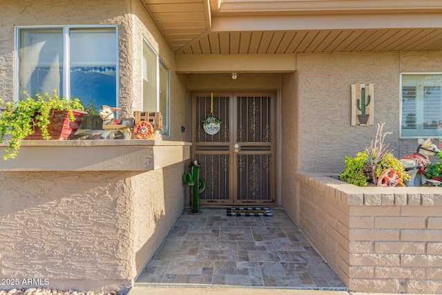 25225 S Glenburn Dr, Sun Lakes, AZ 85248 - doorway to property featuring stucco siding