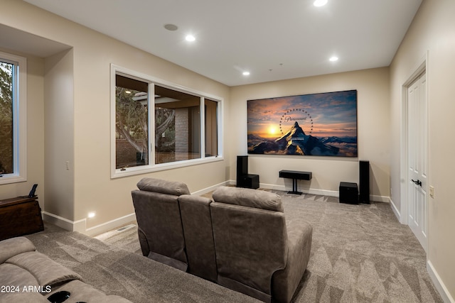 carpeted cinema room featuring recessed lighting, baseboards, and visible vents