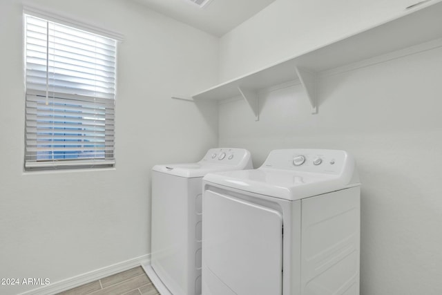 laundry area featuring separate washer and dryer