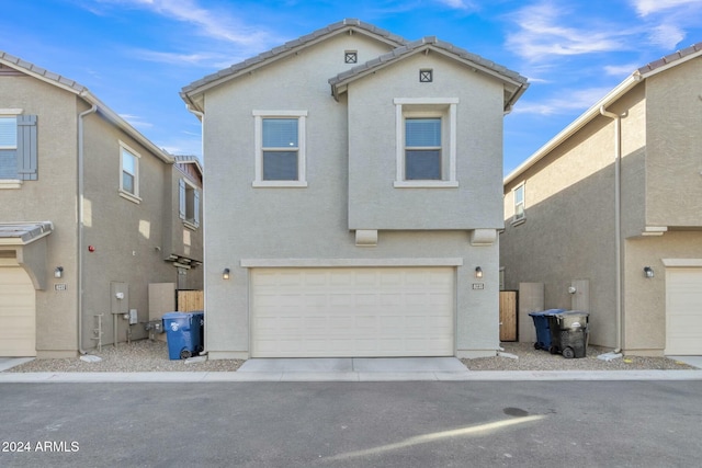 view of front of property featuring a garage