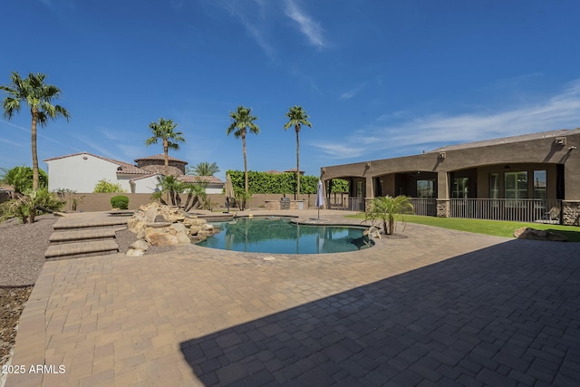10033 W Jj Ranch Rd, Peoria, AZ 85383 - view of pool with a patio and a fenced backyard