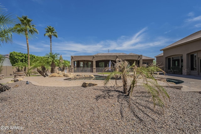 10033 W Jj Ranch Rd, Peoria, AZ 85383 - view of yard featuring a patio and a jacuzzi