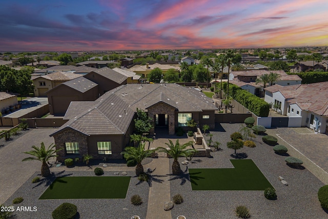 10033 W Jj Ranch Rd, Peoria, AZ 85383 - aerial view at dusk of a residential view