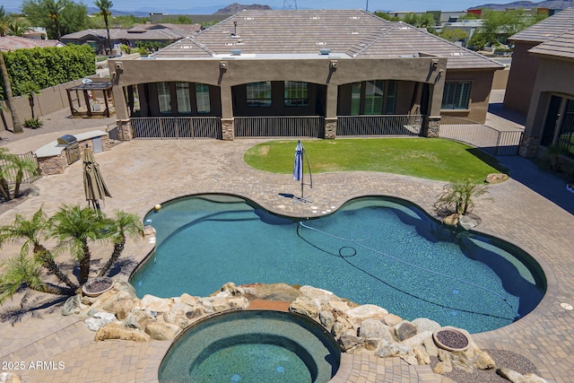 10033 W Jj Ranch Rd, Peoria, AZ 85383 - view of swimming pool featuring a patio, an in-ground hot tub, and a gate