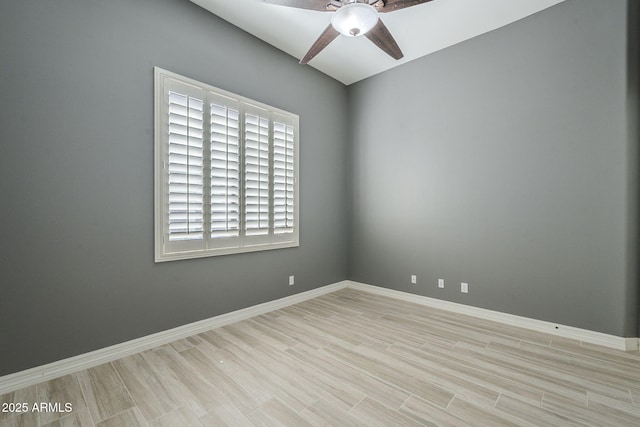 10033 W Jj Ranch Rd, Peoria, AZ 85383 - unfurnished room with ceiling fan, baseboards, and wood finished floors