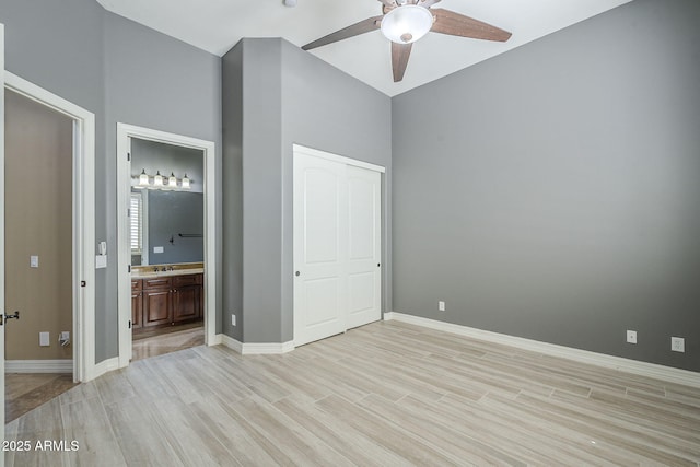 10033 W Jj Ranch Rd, Peoria, AZ 85383 - unfurnished bedroom with light wood finished floors and baseboards