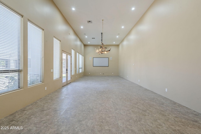 10033 W Jj Ranch Rd, Peoria, AZ 85383 - spare room with a chandelier and recessed lighting