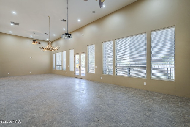 10033 W Jj Ranch Rd, Peoria, AZ 85383 - empty room with a ceiling fan, a towering ceiling, and recessed lighting