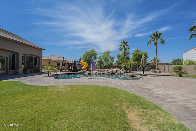 10033 W Jj Ranch Rd, Peoria, AZ 85383 - view of pool with a patio and a water slide