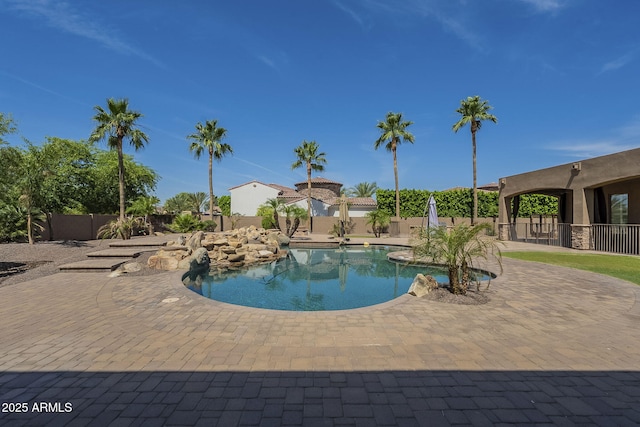 10033 W Jj Ranch Rd, Peoria, AZ 85383 - view of swimming pool featuring a fenced backyard and a patio area