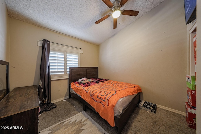 9021 W Mulberry Dr, Phoenix, AZ 85037 - bedroom featuring baseboards, carpet flooring, a textured ceiling, and lofted ceiling