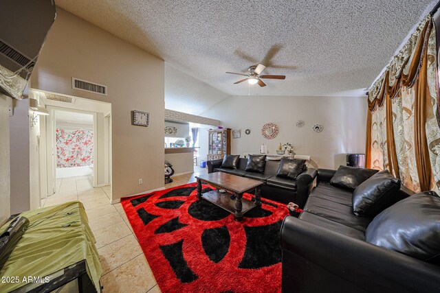 9021 W Mulberry Dr, Phoenix, AZ 85037 - living room with visible vents, a ceiling fan, a textured ceiling, and lofted ceiling