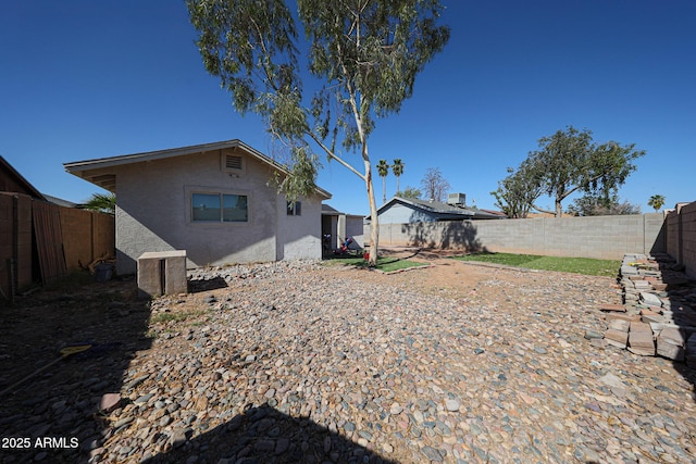 9021 W Mulberry Dr, Phoenix, AZ 85037 - exterior space with a fenced backyard and stucco siding