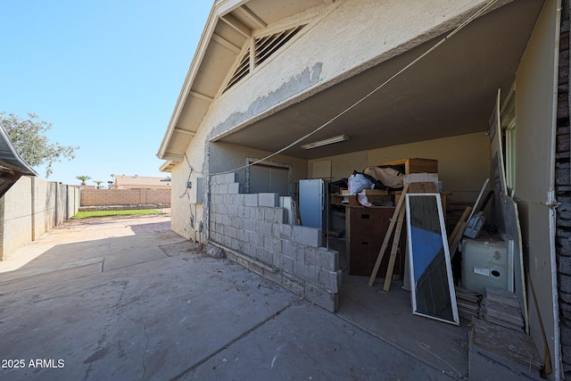 9021 W Mulberry Dr, Phoenix, AZ 85037 - exterior space featuring a patio and a fenced backyard