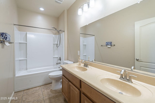 full bathroom featuring toilet, vanity, and shower / bathing tub combination