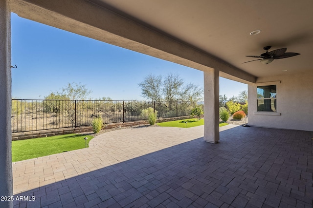 view of patio / terrace featuring ceiling fan