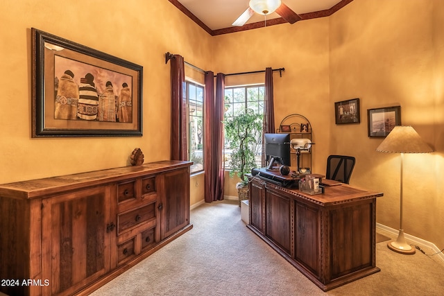 office space featuring ornamental molding, light colored carpet, and ceiling fan