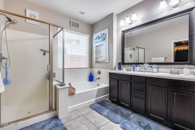 bathroom with vanity, separate shower and tub, and tile patterned floors