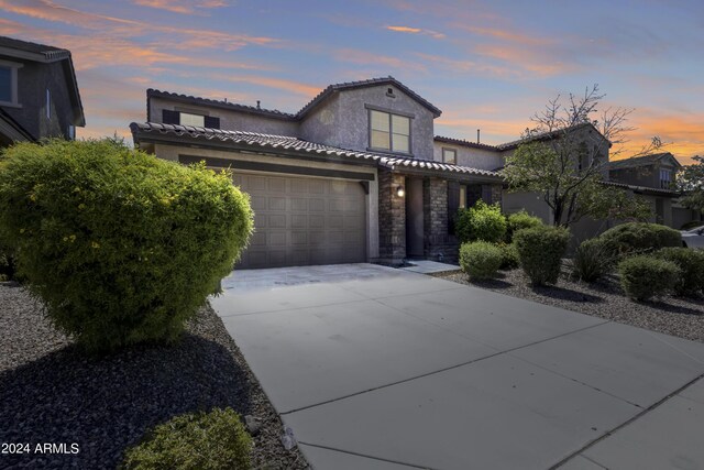 view of front of home with a garage