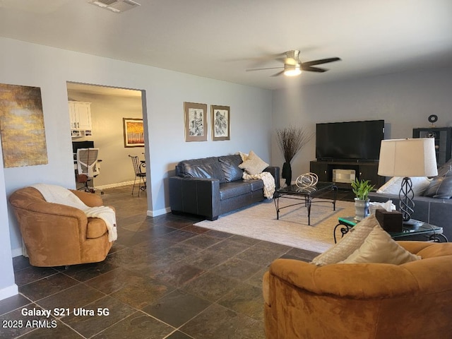 living room with ceiling fan