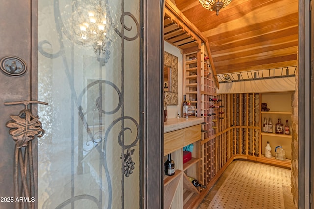 wine area featuring wood ceiling