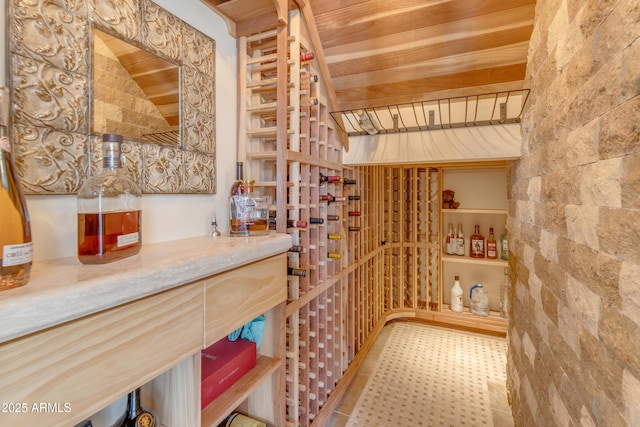 wine room featuring wood ceiling