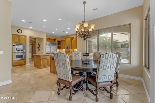 dining room featuring recessed lighting, baseboards, visible vents, and a chandelier