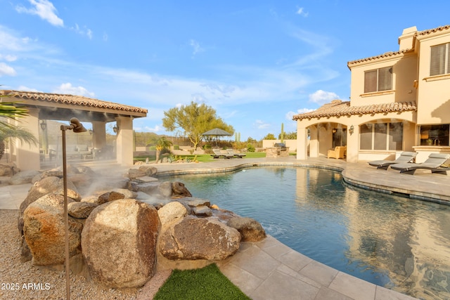 pool with a patio