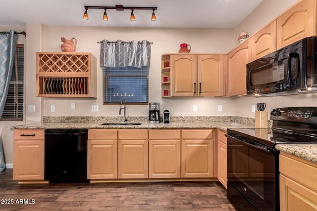 kitchen featuring a sink, black appliances, dark wood-type flooring, light brown cabinetry, and light stone countertops