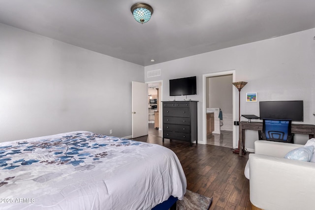 bedroom with visible vents, baseboards, and dark wood-type flooring