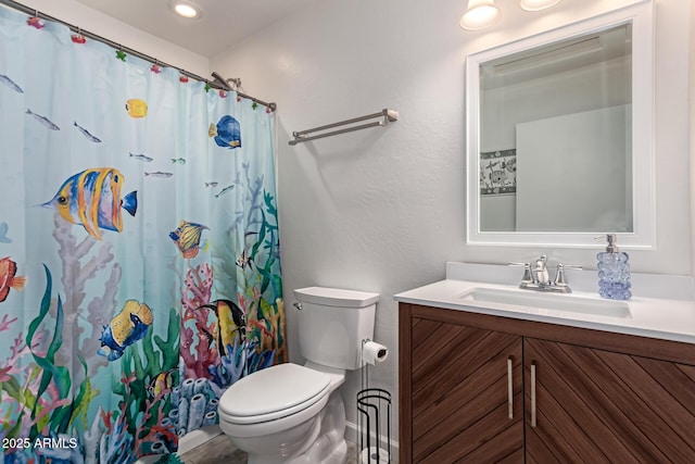 bathroom featuring toilet, vanity, recessed lighting, and curtained shower
