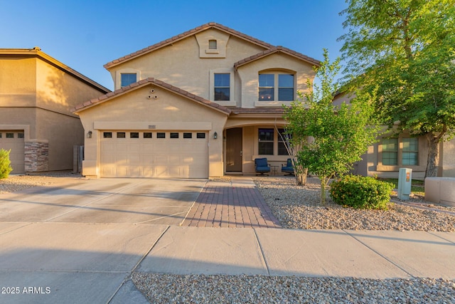 traditional-style house featuring covered porch, an attached garage, a tiled roof, stucco siding, and concrete driveway