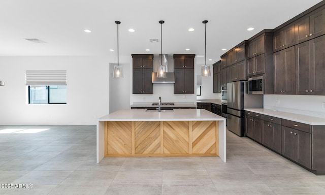 812 E Summerside Rd, Phoenix, AZ 85042 - kitchen featuring wall chimney range hood, stainless steel microwave, dark brown cabinets, a sink, and recessed lighting