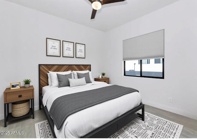 812 E Summerside Rd, Phoenix, AZ 85042 - bedroom featuring baseboards, light wood-style flooring, and a ceiling fan