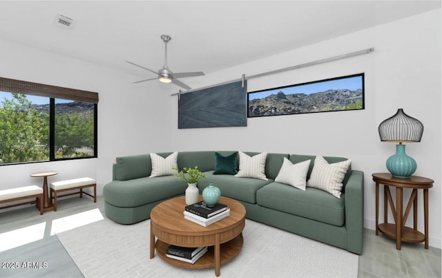 812 E Summerside Rd, Phoenix, AZ 85042 - living room with a ceiling fan and baseboards