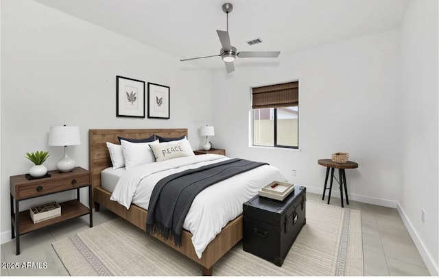 812 E Summerside Rd, Phoenix, AZ 85042 - bedroom featuring light tile patterned floors, baseboards, and a ceiling fan