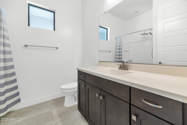 812 E Summerside Rd, Phoenix, AZ 85042 - bathroom featuring toilet, vanity, a shower with shower curtain, tile patterned flooring, and baseboards