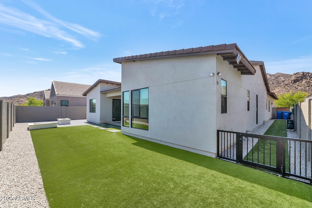 812 E Summerside Rd, Phoenix, AZ 85042 - rear view of property featuring stucco siding and a mountain view