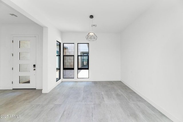 812 E Summerside Rd, Phoenix, AZ 85042 - unfurnished dining area featuring baseboards
