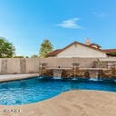 view of pool with a fenced in pool and a fenced backyard