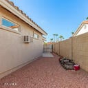 view of property exterior with a fenced backyard