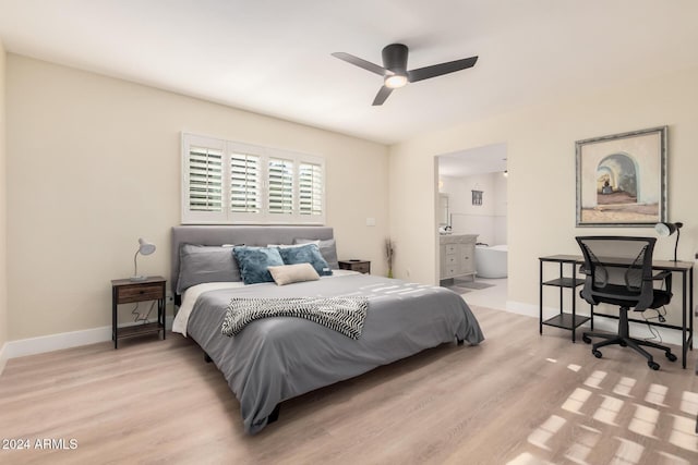 bedroom with connected bathroom, ceiling fan, and light hardwood / wood-style flooring