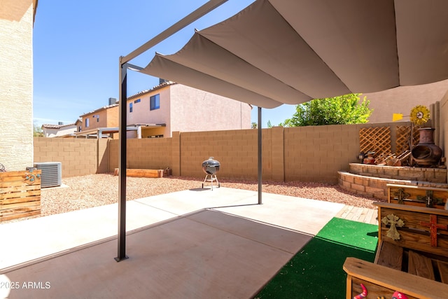 view of patio featuring a fenced backyard and central AC unit