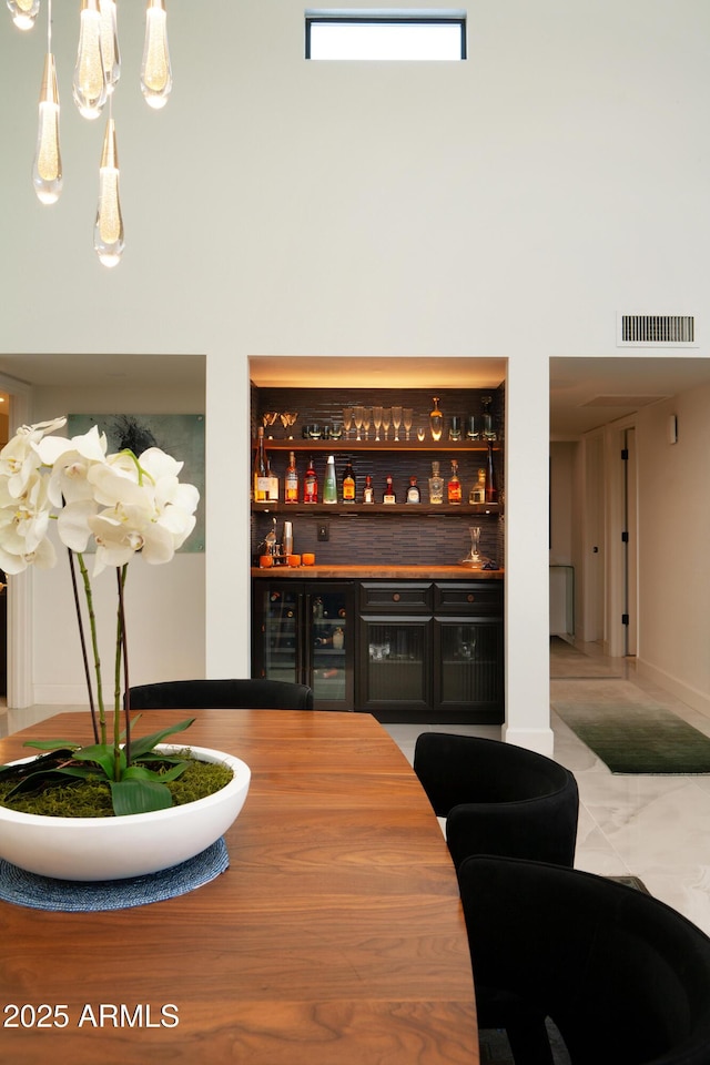 8332 E San Simon Dr, Scottsdale, AZ 85258 - bar featuring a bar, beverage cooler, and visible vents
