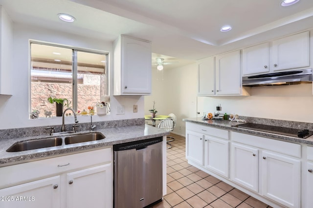 kitchen featuring dishwasher, black electric cooktop, under cabinet range hood, white cabinetry, and a sink