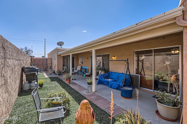 exterior space with fence private yard and a grill